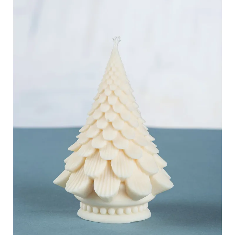 Bougie sapin artisanale en cire végétale de colza sur support bleu, décoration hivernale éthique