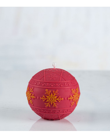 Bougie ronde "Flocon de neige" rouge et jaune – avec flocons de neige peints à la main sur une bande.