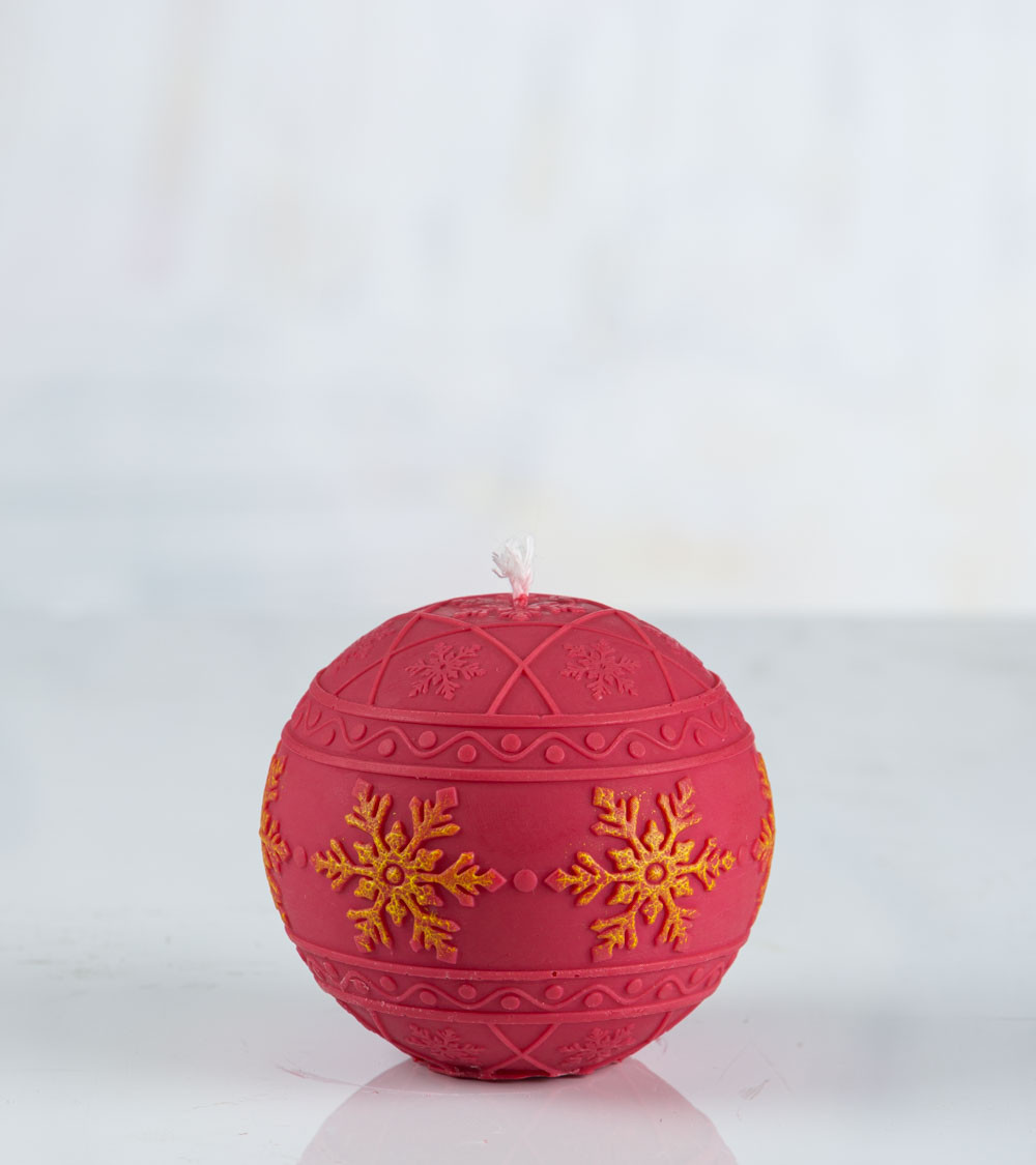 Bougie ronde "Flocon de neige" rouge – décorée de flocons jaunes peints à la main en bande centrale, fabrication artisanale